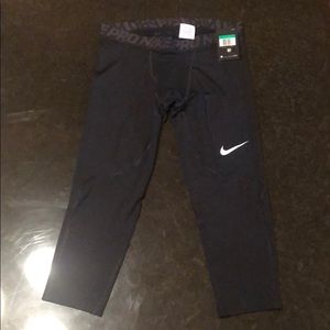 Nike 3/4 leggings. Never worn. With tags.